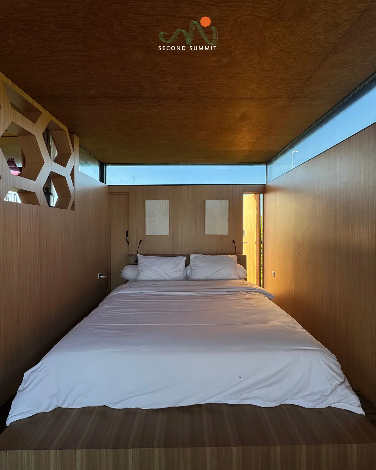 Private villa bedroom with honeycomb shelving